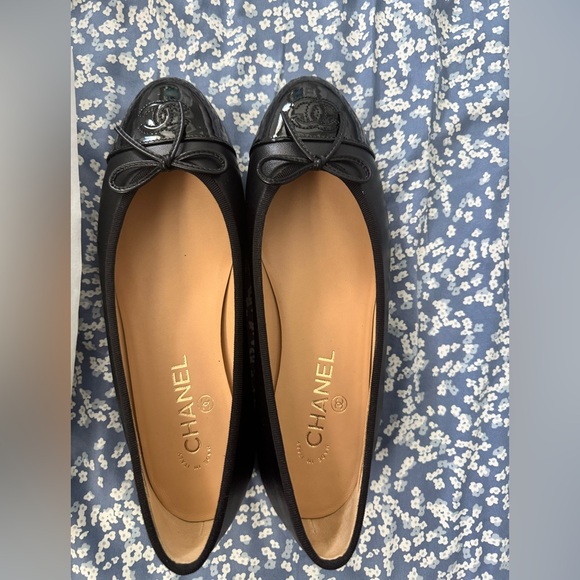 CHANEL Shoes - CHANEL Black Patent Cap-Toe Flats